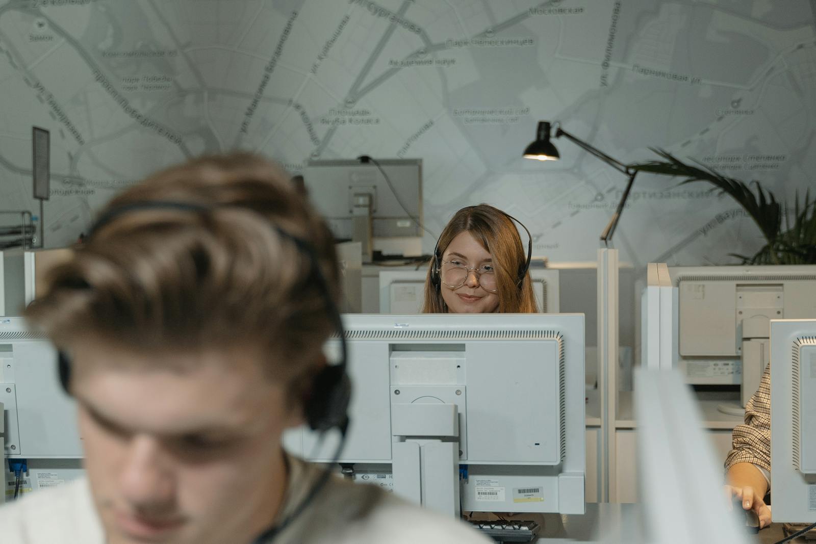 Contact center agents working with headsets